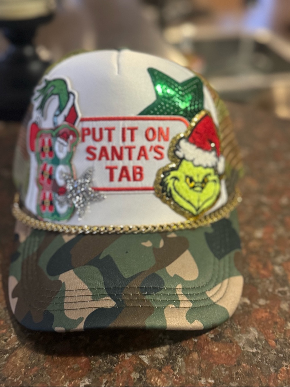 Women’s Camouflage Trucker Hat with Grinch Holiday Patch. Handmade.